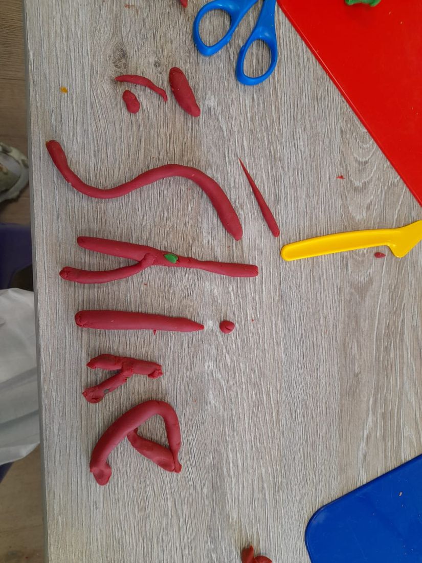 Writing letters in sand