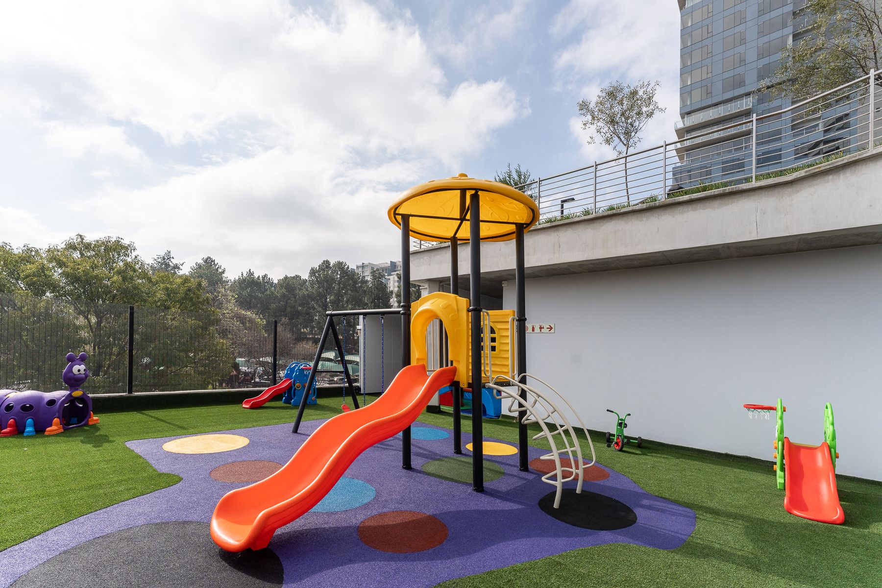 Rooftop playground with a slide